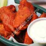 20 alitas, papas, vegetales y dip por $179 en Wings Army por Grupon