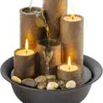 Liquidación en fuente de mesa con velas y piedras baja a su menor precio