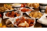 Hasta $100 de descuento o poste gratis en Wingstop con Cuponatic