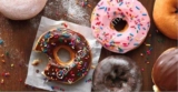 Fiesta de docenas Dunkin Donuts: 2×1 en donas + café gratis este 13 de junio